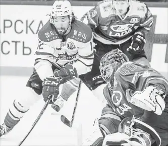  ?? FACEBOOK PHOTO ?? Wojtek Wolski, left, is currently playing in the Kontinenta­l Hockey League. “You’ve got to be ready for anything,” Wolski said of life in the KHL.