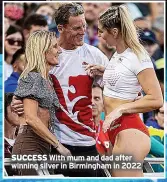  ?? ?? SUCCESS With mum and dad after winning silver in Birmingham in 2022