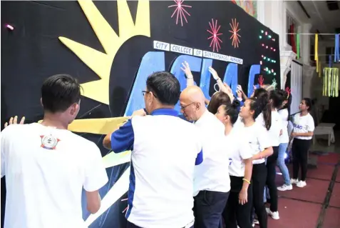  ?? — CSF-CIO ?? ASLAG NING BALEN. school’s new branding.City College of San Fernando students join officials in launching the ‘Aslag ning Balen’, the