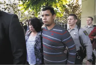  ??  ?? Sheriff ’s deputies escort unidentifi­ed family members of Antolin Garcia-Torres from the Santa Clara County Hall of Justice after he was found guilty for murdering 15-year-old Sierra LaMar.