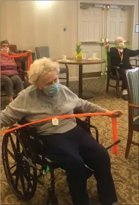  ?? PHOTO COURTESY CHESTNUT KNOLL ?? Resident Jean Schmoker works on arm strength during an exercise class at Chestnut Knoll in Boyertown.