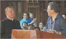  ?? | MATTHEW HENDRICKSO­N/ SUN- TIMES ?? The Rev. Michael Pfleger with Yo- YoMa at a Concert for Peace on Sunday afternoon at St. Sabina Church.