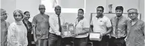  ??  ?? HNB Chief Transforma­tion Officer Chiranthi Cooray hands over ACT machine to Lady Ridgeway Hospital Deputy Director Dr. Yapa Bandara