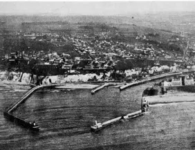  ??  ?? Above: Boats docked at Dieppe Harbour, circa 1942. Below: The entrance to Dieppe’s port.