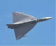  ?? REUTERS ?? An Indian Air Force Tejas jet fighter performs during Aero India 2023 at Yelahanka air base in Bangalore on Feb 13.