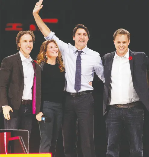  ?? MATT day / POSTMEDIA NEWS FILES ?? Canada’s Prime Minister Justin Trudeau and his wife Sophie Grégoire Trudeau are flanked by WE Day co-founders Craig Kielburger, left, and Marc Kielburger, right.