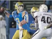  ?? Luis Sinco Los Angeles Times ?? JOSH ROSEN and the Bruins are drawing some heat from the fans three games into the season.