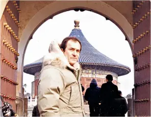  ??  ?? Bertolucci on the set of The Last Emperor in Beijing and, below, three of his most famous films