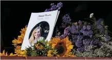  ?? LANDSBERG African News Agency (ANA)
IAN ?? THE funeral programme of murdered Maties student Hannah Cornelius, on a wreath, outside the Fish Hoek Dutch Reform church where her memorial service was held. |