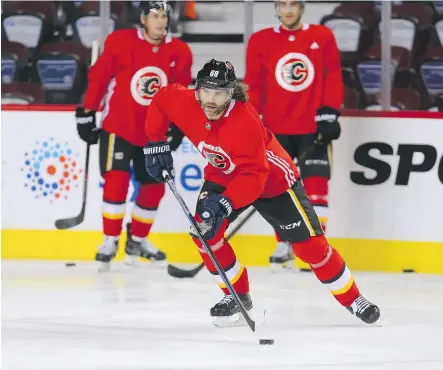  ?? PHOTOS: GAVIN YOUNG ?? Jaromir Jagr admitted his 45-year-old body had trouble coping with the fast pace of his first practice with the Flames on Thursday. The NHL’s secondlead­ing scorer of all-time was still feeling the effects of the long flight from Czech Republic the...