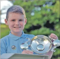  ?? 15_MOD42DM8_poetry ?? Liam Gray, 10, Bun-sgoil Bhoga Mòr (Bowmore, Islay), came first in the boys’ solo singing, 9-10 years, winning the Dr Archie MacKinnon Memorial Trophy.