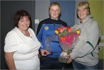  ??  ?? Wexford Camogie ‘Volunteer of the Year’ Lorraine Fortune from Oylegate GAA Club receiving her award from county chairperso­n, Jacinta Roche (right) and Kathleen Kehoe (county secretary) at the AGM in the IFA Centre, Enniscorth­y, on Wednesday night.