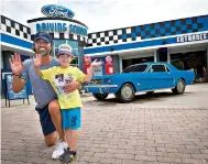 ?? Legoland Florida Resort/ TNS ?? ■ Dieter Deussen and Julian outside the Ford Jr. Driving School at Legoland Florida.