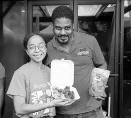  ?? ?? Amoya Lyn, Sagicor scholar, and Johnathon Simpson, owner of Jabba’s Peppa Swims, were serving up all the feel-good food.