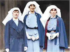  ?? DEPARTMENT OF NATIONAL DEFENCE/LIBRARY AND ARCHIVES CANADA/THE VIMY FOUNDATION ?? They Fought in Colour includes scenes of warmth and joy — such as this photo of nursing sisters Mowat, left, Mcnichol and Guilbride — but it’s not a sugar-coated treatment of the war.