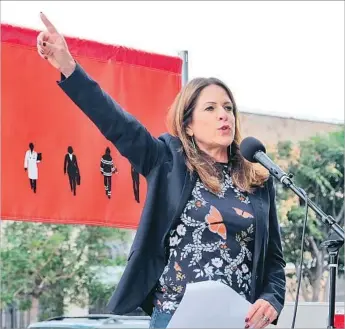  ?? Sarah Morris Getty Images ?? CATHY SCHULMAN, a movie producer and president of Women in Film L.A., is shown at the Take Back the Workplace March on Nov. 12. “This explosion of news has come as a shock to all of us,” she says.