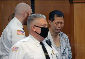  ?? STuART CAHiLL / HeRALd sTAFF ?? ‘VERY TRAGIC’: Chenghai Xue is arraigned on murder charges Friday in Somerville for hitting his nephew with a car and then shooting him at the Cambridge District Courthouse.