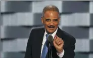  ?? MARCUS YAM/LOS ANGELES TIMES ?? Former Attorney General Eric Holder speaks during the second day of the Democratic National Convention on July 26, 2016, at the Wells Fargo Center in Philadelph­ia, Pa.