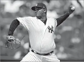  ?? KATHY WILLENS/AP PHOTO ?? New York Yankees starting pitcher CC Sabathia throws during the first inning of Saturday’s game against the Chicago White Sox at New York. The Yankees won 4-0.