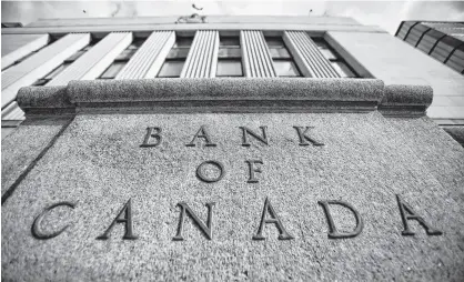  ?? CHRIS WATTIE ■ REUTERS FILE ?? Another Bank of Canada rate hike would squeeze Canadians paying mortgages harder.