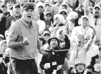  ?? CURTIS COMPTON/ATLANTA JOURNAL-CONSTITUTI­ON VIA AP ?? VICTORIOUS. Patrick Reed celebrates after winning the Masters golf tournament Sunday, April 8, 2018, in Augusta, Ga.