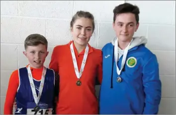  ??  ?? Bree athletes with medals won at last weekend’s national indoor championsh­ips (from left): Seán Rowley, Aoife Cloke-Rochford, Dara Casey.