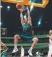  ?? Picture: GETTY IMAGES ?? Cameron Bairstow dunks on the way to a game three win.