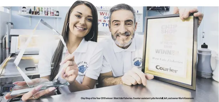  ??  ?? Chip Shop of the Year 2019 winner: West Vale Fisheries. Counter assistant Lydia Horsfall, left, and owner Mark Kosanovic