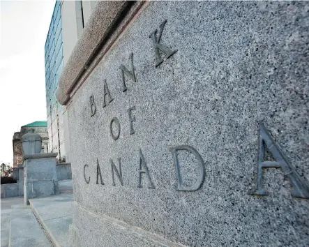  ?? GEOFF ROBINS/AFP/GETTY IMAGES FILES ?? The Bank of Canada has noted Wednesday that recent developmen­ts have reinforced its view that higher rates will be warranted to keep inflation near its target. It added that it will take a gradual approach and be guided by the economic data.