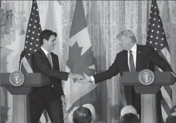  ?? OLIVIER DOULIERY/ABACA PRESS ?? U.S. President Donald Trump and Canadian Prime Minister Justin Trudeau participat­e in a joint news conference in the East Room of the White House on Feb. 13 in Washington, D.C.