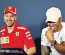  ??  ?? HAVING A LAUGH Vettel and Hamilton