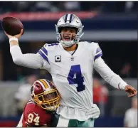  ?? AP/ROGER STEINMAN ?? Dak Prescott and the Dallas Cowboys are in first place in the NFC East with four games remaining in the regular season. The Cowboys face the Philadelph­ia Eagles on Sunday at AT&amp;T Stadium in Arlington, Texas.