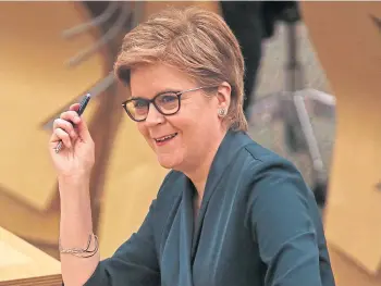  ?? ?? QUESTIONS: Nicola Sturgeon said government action had helped reduce infections.