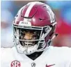  ?? JONATHAN BACHMAN/GETTY ?? Tua Tagovailoa, who Miami selected in the 2020 NFL draft, will wear No. 1 in upcoming seasons.