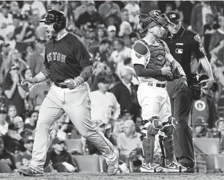  ?? Wally Skalij / TNS ?? First baseman Steve Pearce was 2-for-4 with four RBIs to lead the Red Sox. His hits were a base-clearing double and a solo homer.