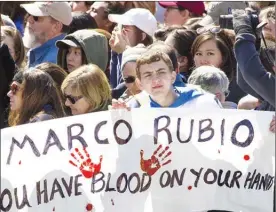  ??  ?? Protesters attend the March for Our Lives rally in support of gun control in Washington, Saturday, on Pennsylvan­ia Avenue near the U.S. capitol.