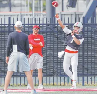  ?? Jay Laprete The Associated Press ?? Justin Fields on taking over the Ohio State offense: “You can’t just come in and just act like you’re a leader. You have to build relationsh­ips … Then you can step out and become a leader.”