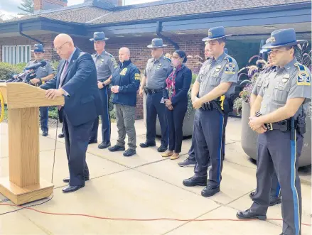  ?? DON STACOM/HARTFORD COURANT ?? Connecticu­t State Police Commission­er James Rovella speaks at Troop L barracks on Thursday, announcing the in-the-line-of-duty death of Sgt. Brian Mohl.