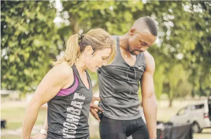  ??  ?? RACY. Kabelo Thathe and Planet Fitness instructor Caryn Wilson put tge park group through their paces.