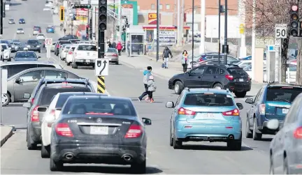  ?? ALLEN McINNIS ?? While the Blue Line will get more cars off the road, it will add to headaches riders face on the packed Orange Line, says Allison Hanes.