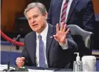  ?? PATRICK SEMANSKY ASSOCIATED PRESS ?? FBI Director Christophe­r Wray testifies Tuesday before the Senate Judiciary Committee. He defended his agency’s performanc­e during the Jan. 6 Capitol riots, which he said were part of a rising tide of domestic terror.