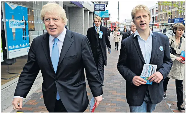  ??  ?? Boris Johnson campaignin­g in Orpington, Greater London on Mayoral Election Day in 2012 with his brother Jo Johnson, who has been nominated for a peerage less than a year after he resigned as a minister over Brexit