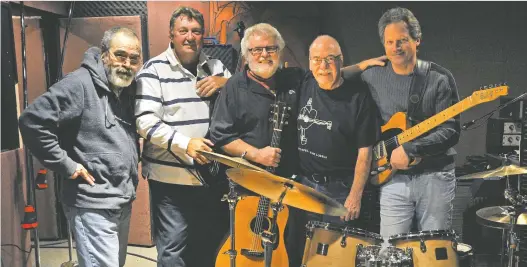  ?? LARRY WONG FILES ?? Stu Mitchell, second from right, with members of The Rebels, rehearsing for a reunion show in Edmonton in 2012.