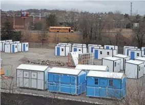  ?? KRIS CRAIG/THE PROVIDENCE JOURNAL ?? ECHO Village Pallet shelters await placement on state land in Providence, Rhode Island.