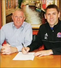  ??  ?? SIGN ON: Dave Challinor agrees his contract extension