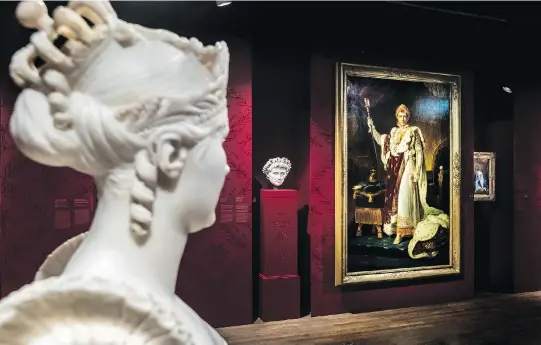  ?? PHOTOS: DAVE SIDAWAY ?? A bust of Empress Josephine faces François-Pascal-Simon Gérard’s portrait of Napoleon in ceremonial robes at the Montreal Museum of Fine Arts, where an exhibition of the French ruler is on display through May 6. “We want people to have a good...