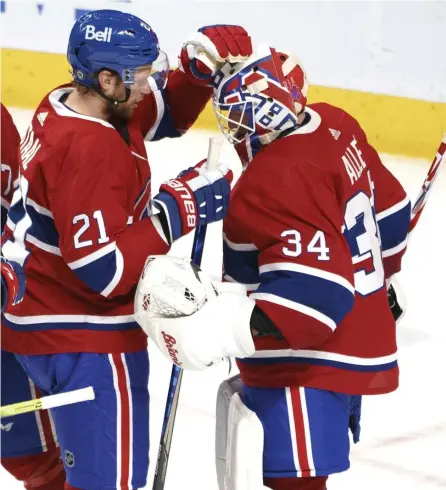  ?? Ap ?? HAPPY HABS: Montreal’s Eric Staal congratula­tes goaltender Jake Allen after the Canadiens defeated the Calgary Flames 2-1 on Friday night.