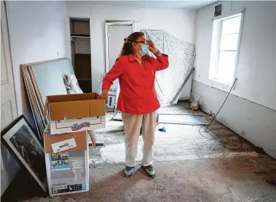  ?? Mark Mulligan / Staff file photo ?? Valeria Tamez, a southeast Houston resident, awaits relief for repairs to her home years after Harvey damaged it.