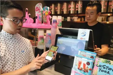  ?? PHOTOS PROVIDED TO CHINA DAILY ?? Left: Tech-savvy customers, with their FPS-enabled smartphone, can place their food or beverage orders at cafes without having to carry cash or rummage through their wallet for the Octopus card.