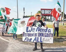 ?? ?? Jose Hernandez, 15, joins a rally on Friday in Tampa, Fla., to protest SB 1718, the anti-immigratio­n laws set to go into effect on Saturday. A new Florida law voids driver’s licenses issued by other states to people in the country illegally.
